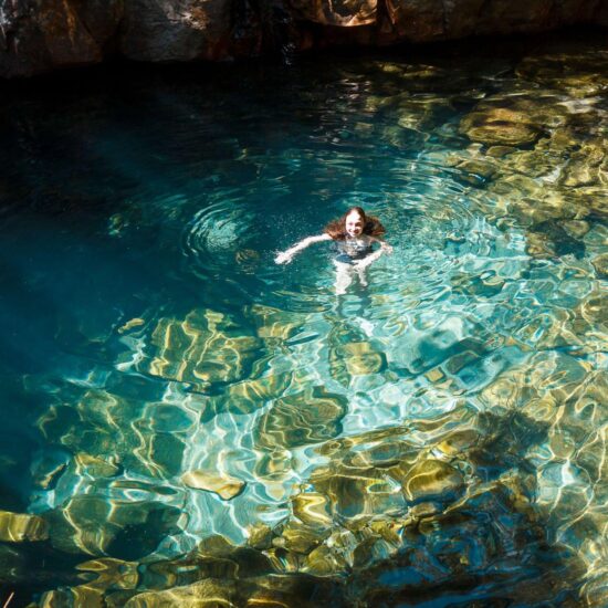 Crystal-clear pool at a waterfall in Chapada dos Veadeiros